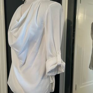 Beautiful light weight white cotton long or roll sleeve blouse. Dressy or casual